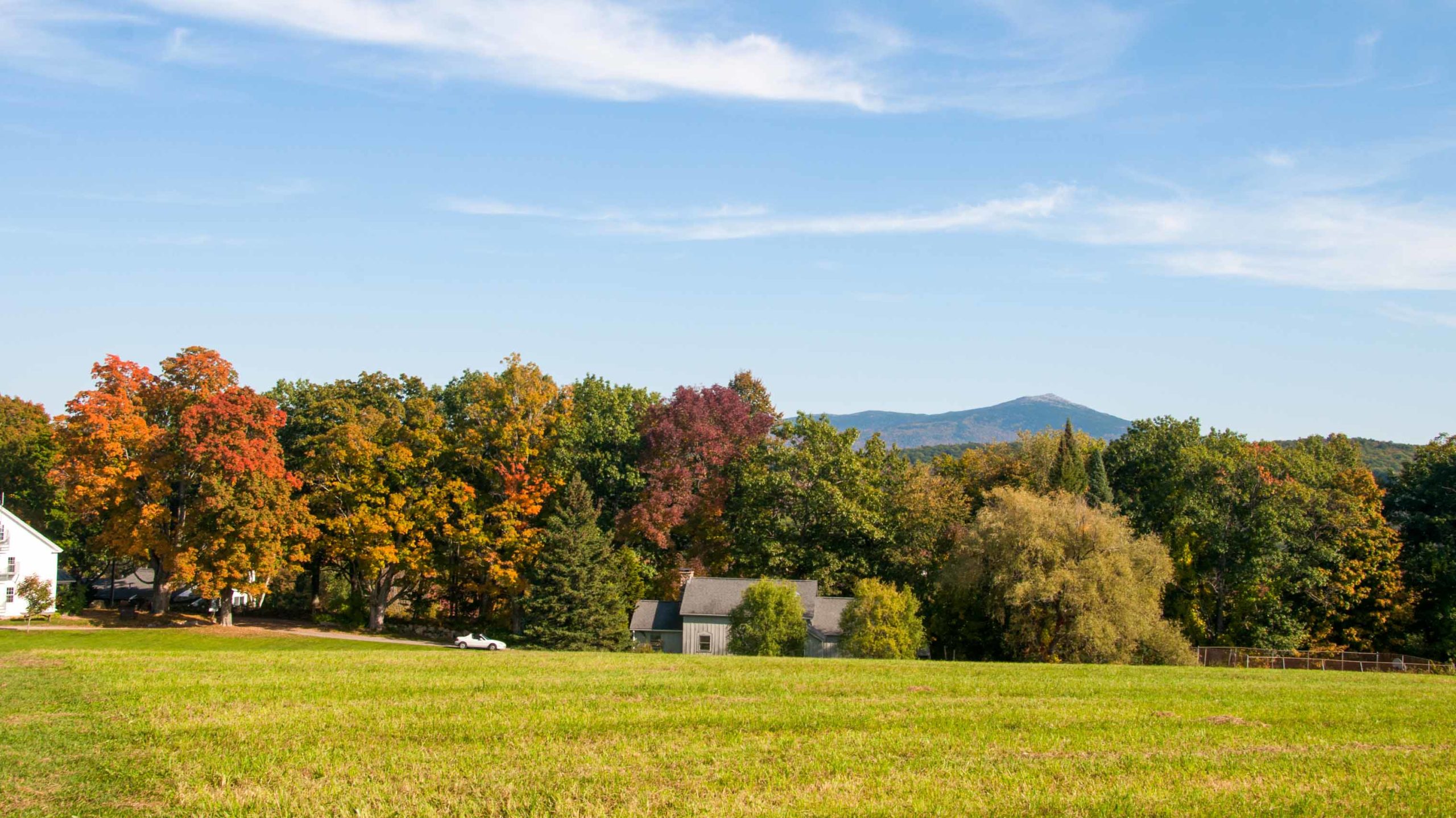 A view of the glen brook grounds when the leaves are starting to change.