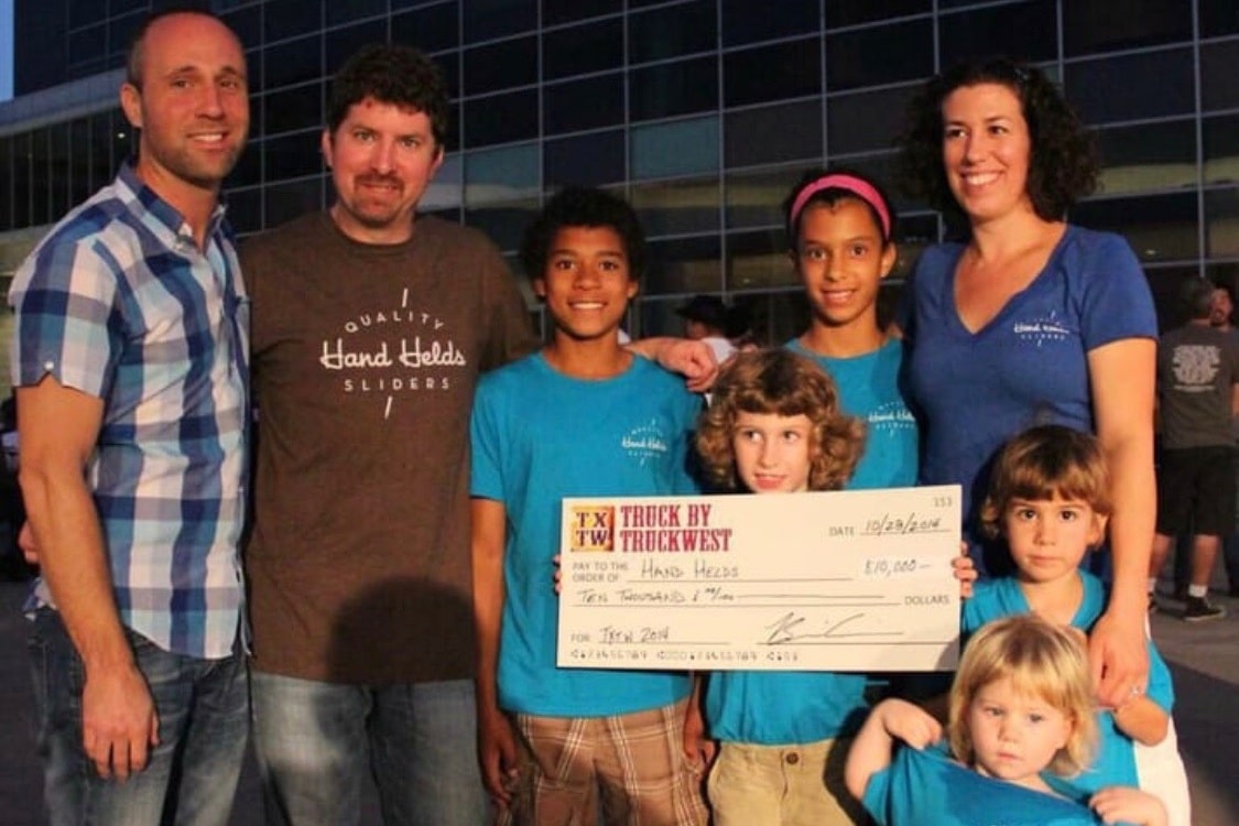 Robyn (second from left) and the Family receiving the 2014 Best Food Truck award.