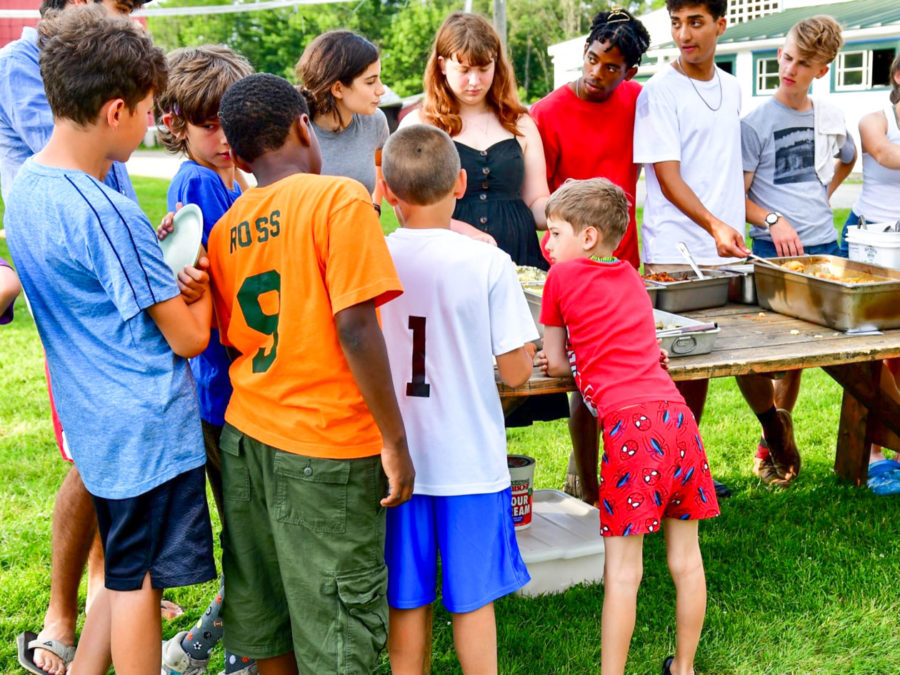 Campers lining up to eat food